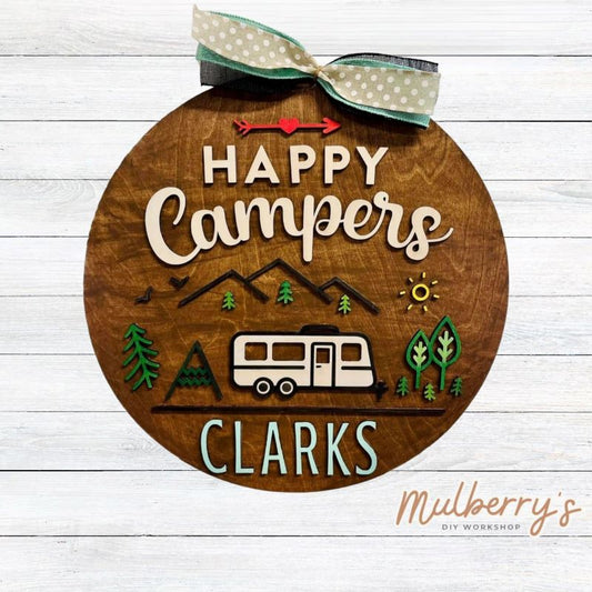 Personalize our Happy Campers 18-inch door hanger with your last name, then show it off at the campground!