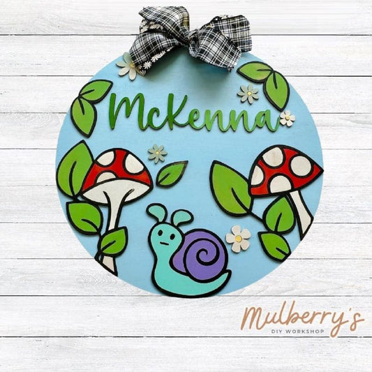 Decorate your indoor forest with our personalized mushroom 18" door hanger!