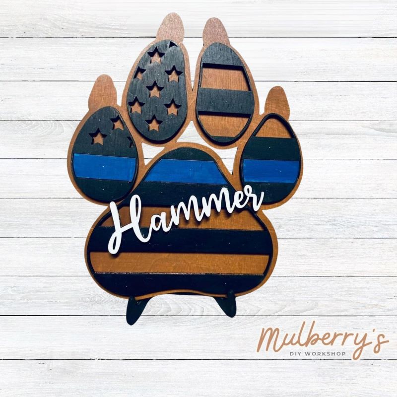 Honor your favorite K-9 with our personalized paw! Approximately 10" tall by 8" wide. Optional stand is available.