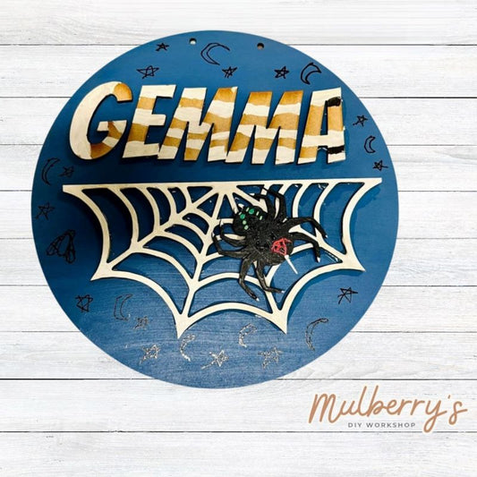 Our mini 9.5" door hanger with a spider and is a popular project for kids! This design can be personalized with a name in either print or cursive.