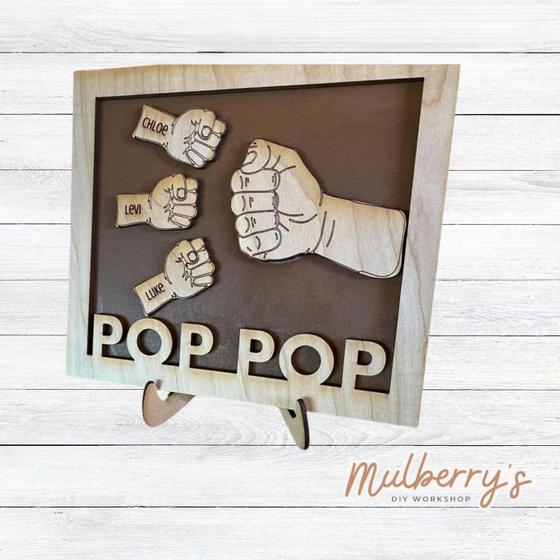 Our personalized pop pop sign makes the perfect Father's Day gift! Approximately 6.5" tall by 6.5" wide. Can include up to 4 fists. Optional stand is available.