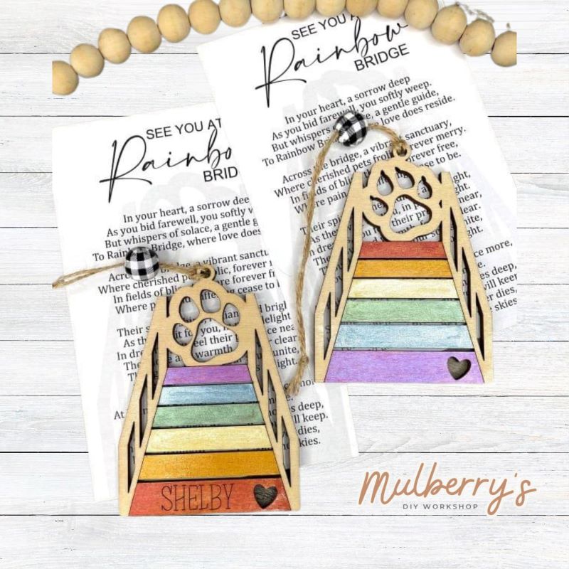 Remember your special friend with our personlized rainbow bridge ornament.&nbsp; There are two versions: cat and dog. Each version includes your pet's name engraved on the bridge in print and a special poem. Ornaments are approximatley 4 inches tall.