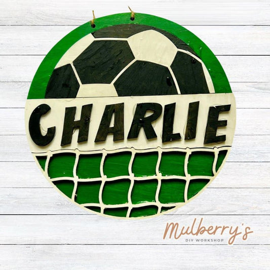 Our 9.5-inch mini door hanger is perfect for the soccer player or for a team building event for your players! Personalized it with your team, player number and/or player's name!