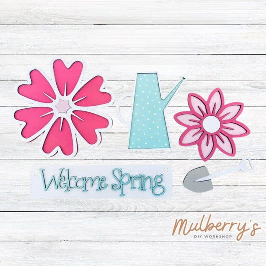 Our spring flower inserts are so versatile! Display them individually or in our interchangeable wagon or crate! Includes watering can, two flowers, gardening tool, and the hello spring banner.