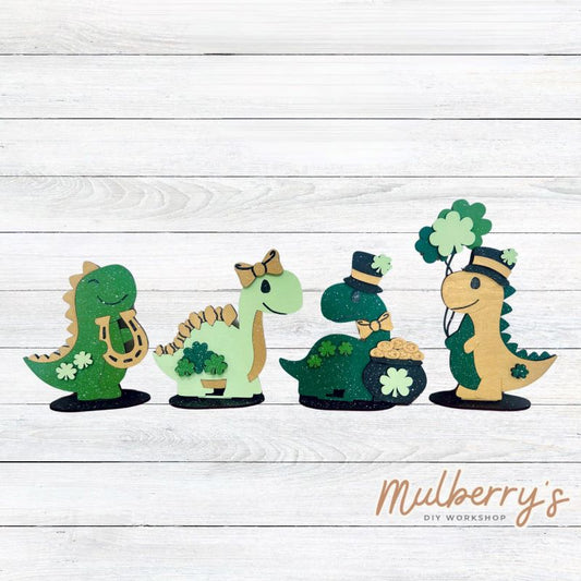 Our st. patty dino shelf sitters are super cute! Approximately 5" wide by 8" tall. Each dino includes a stand and can be purchased individually or as a set.