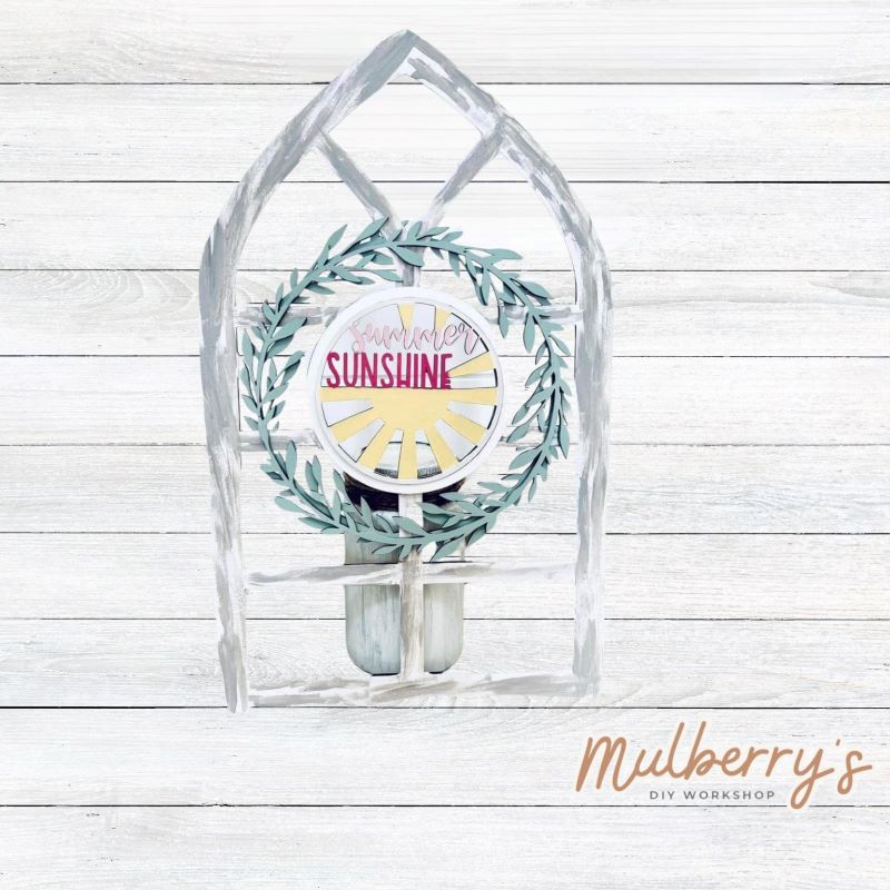 We love our interchangeable window! It's approximately 16" tall by 10" wide and can display your favorite seasonal/holiday insert. This set includes the interchangeable window and summer insert.