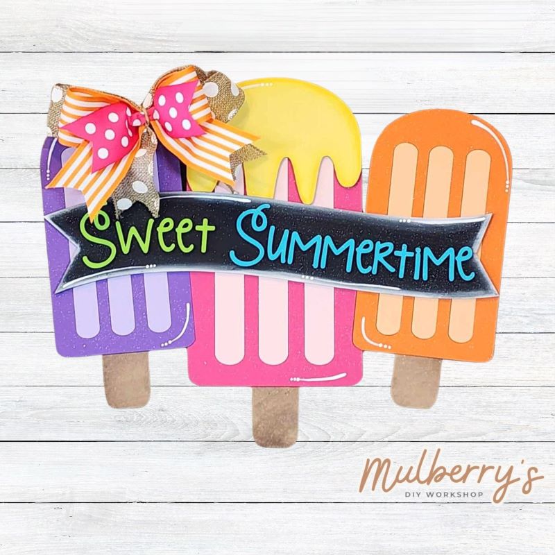 Celebrate summer with our sweet summertime popsicle mini door hanger! Approximately 9" tall by 11.5" wide.