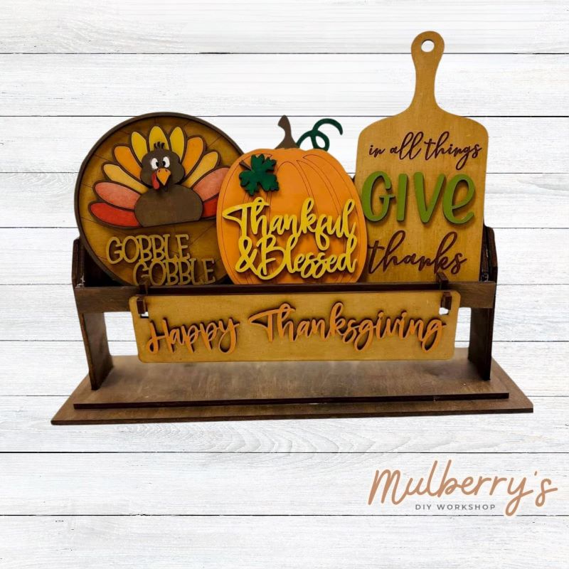 It doesn't get any cuter than our little rustic crate! It's a perfect add on accessory to your décor. It's approximately 13" long. Includes: Crate and Thanksgiving Inserts. Thanksgiving inserts include Gobble Gobble Turkey Circle, Thankful & Blessed Pumpkin, Give Thanks Cutting Board, and the Happy Thanksgiving banner.