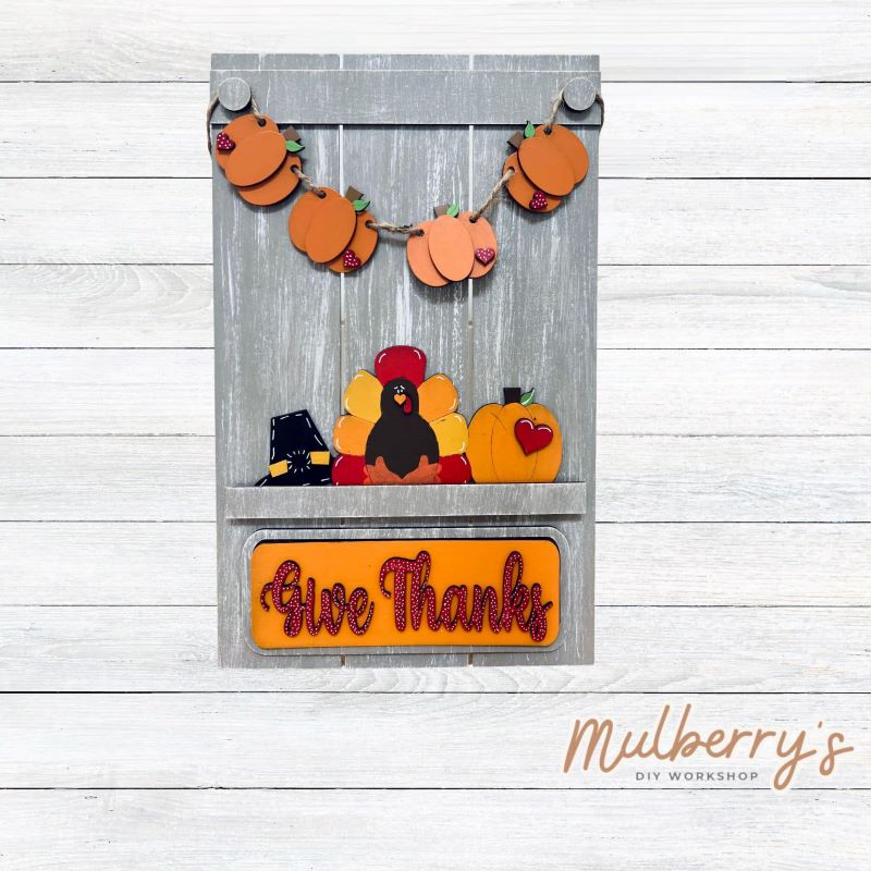 Our Interchangeable Pallet Stand measures roughly 15" tall by 9" wide.  This project can easily be changed out for holidays, seasons and other themes. The set includes the pallet stand and thanksgiving inserts.