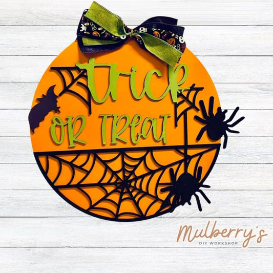 Trick or treat! Our Trick or Treat 18" door hanger is perfect for Halloween!