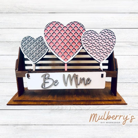 It doesn't get any cuter than our little rustic crate! It's a perfect add on accessory to your décor. It's approximately 13" long. Includes: Crate and Valentine Inserts. Valentine inserts include three hearts and the Be Mine banner.