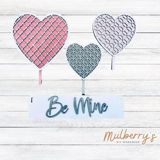 Our valentine inserts are so versatile! Display them individually or in our interchangeable wagon or crate! Includes three hearts and the Be Mine banner.