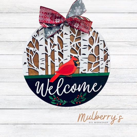 Looking for a beautiful winter door hanger to display in your home? Our 18" welcome door hanger with cardinal and birch trees is stunning!