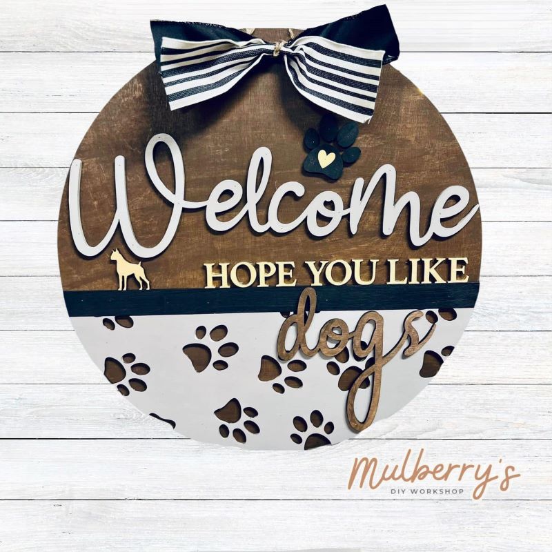 Welcome your family and friends with our pet friendly 18" door hanger!