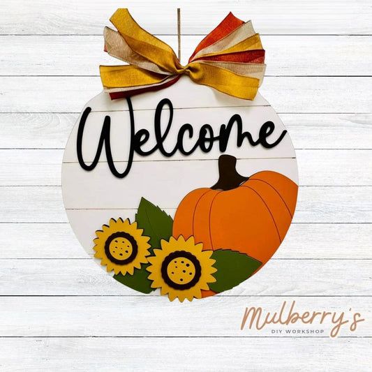 Welcome family and friends this fall season with our Welcome Pumpkin 18" door hanger!