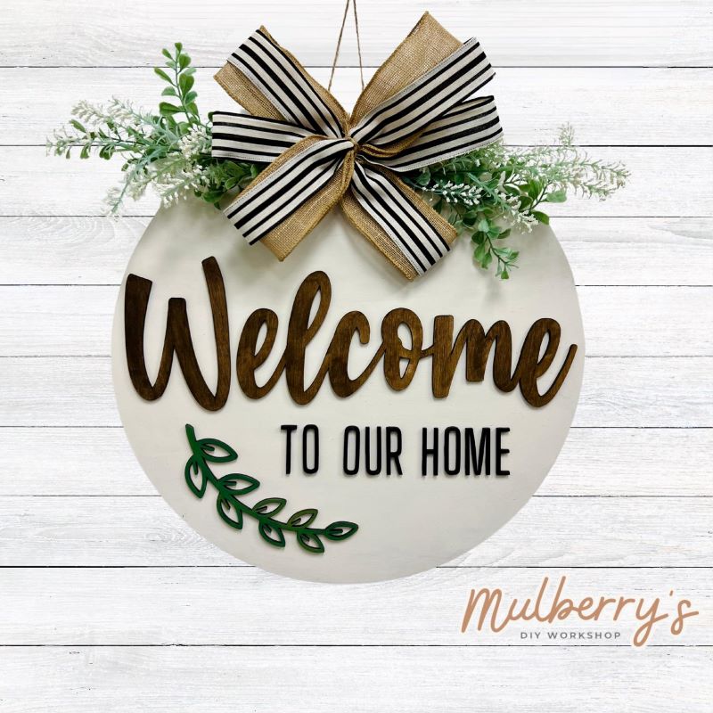 Welcome your guests to your home before they even make it in the door with our 18-inch "Welcome To Our Home Floral" door hanger! It's sure to make them feel at home as soon as they arrive!